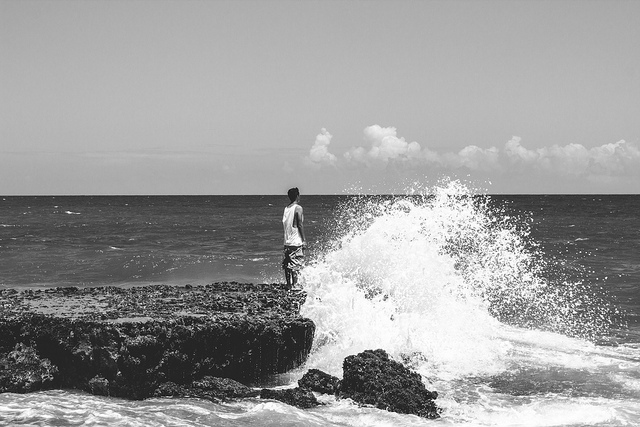 boy alone on beach