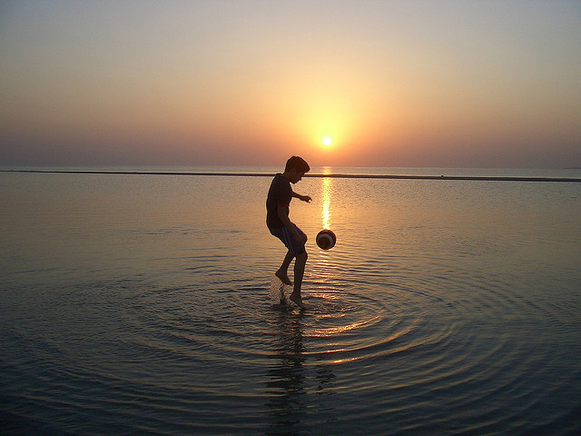 boy playing with ball